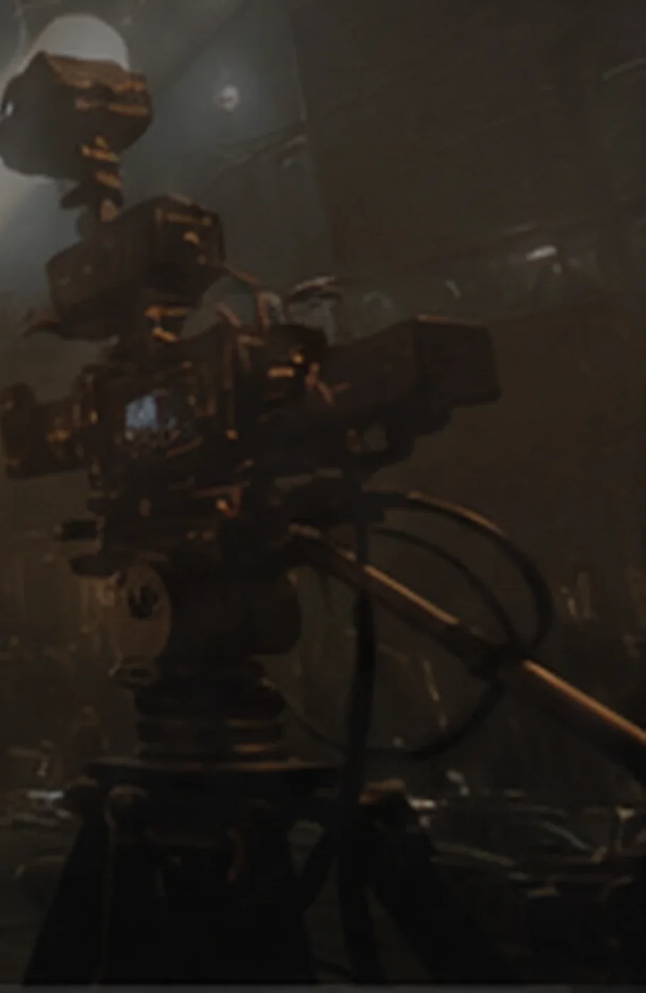 A studio camera on a darkened stage